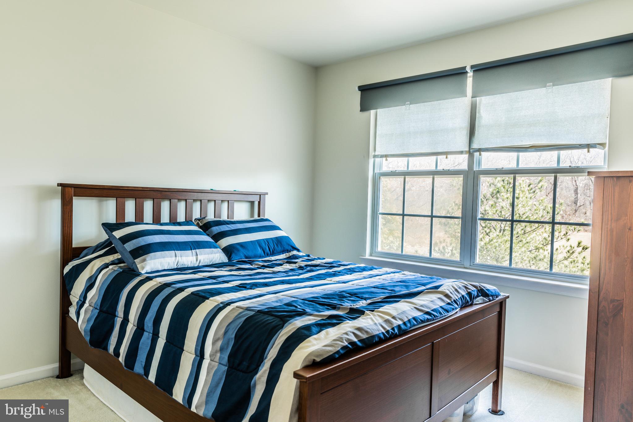 108 Eagleview Terrace Mount Royal, NJ 08061 - Photo 9 of 24 a bedroom with a bed and a window