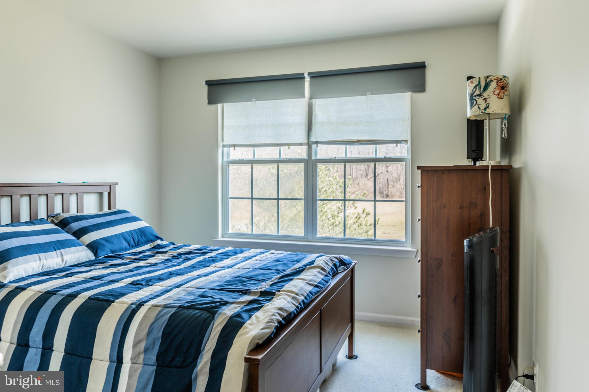108 Eagleview Terrace Mount Royal, NJ 08061 - Photo 10 of 24 a bedroom with a bed and a window