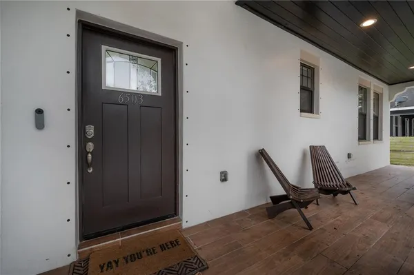 a work room with furniture and windows