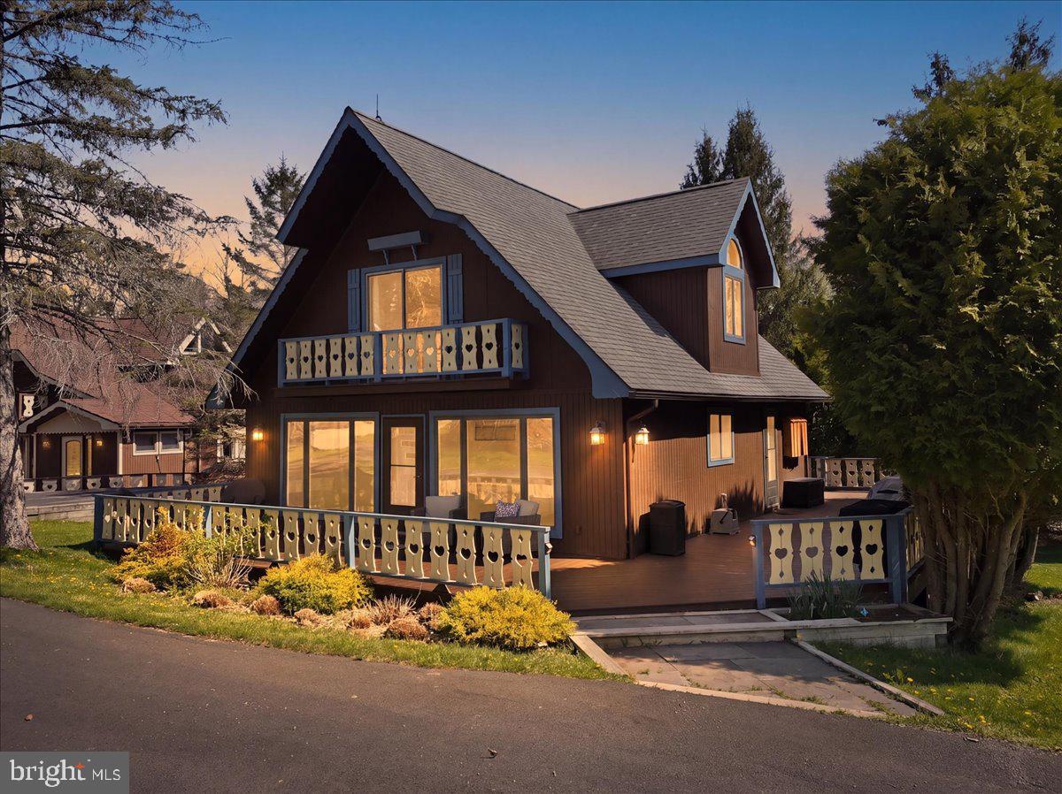 Charming chalet at twilight glow.