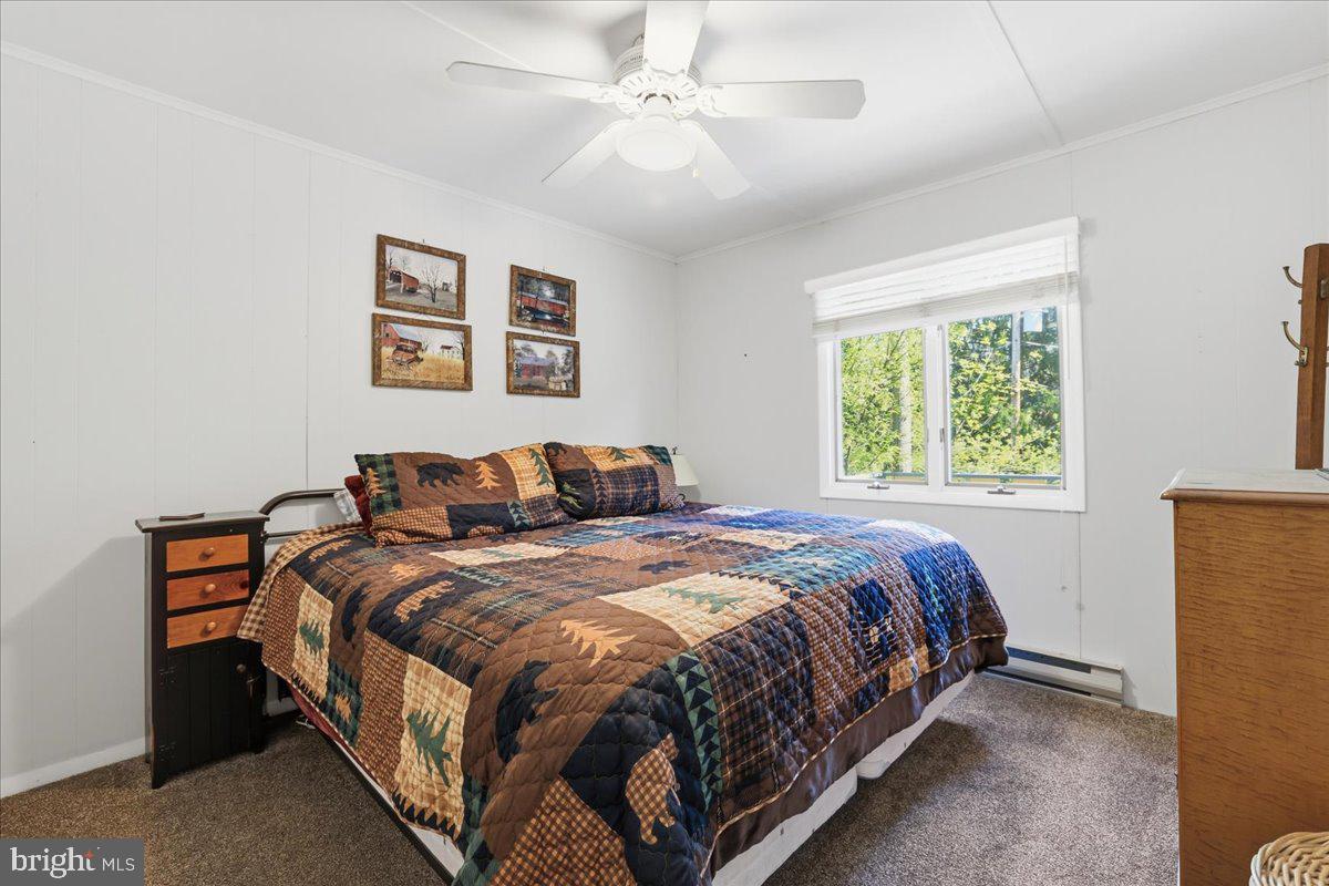 25 Fall Place Union Dale, PA 18470 - Photo 32 of 99 Cozy bedroom with natural light.
