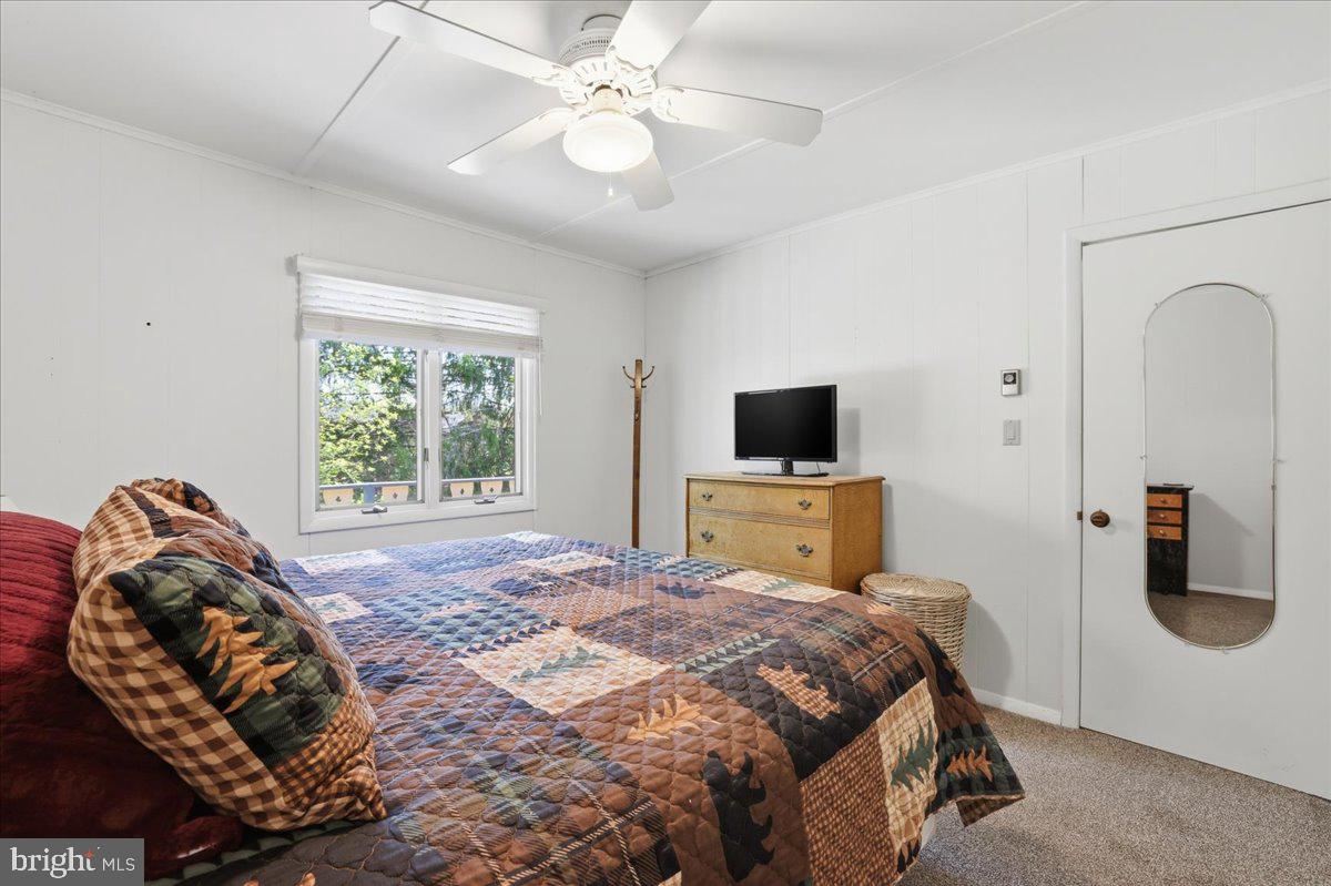 25 Fall Place Union Dale, PA 18470 - Photo 34 of 99 a bedroom with a bed and a television