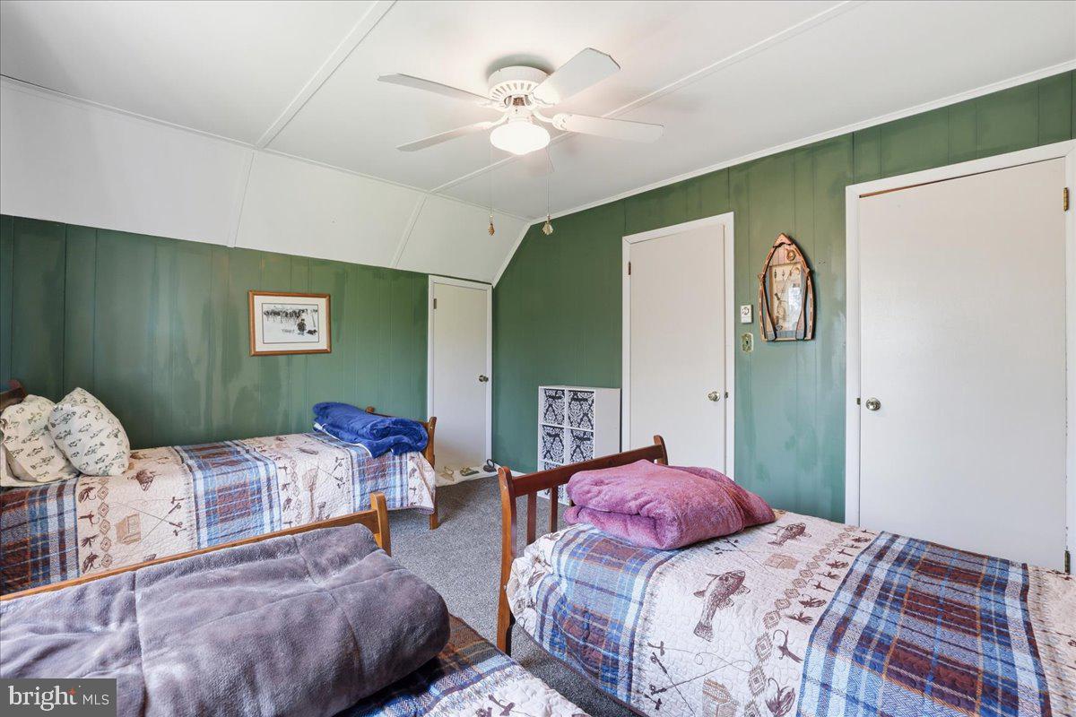 25 Fall Place Union Dale, PA 18470 - Photo 52 of 99 a bedroom with a bed and wooden floor