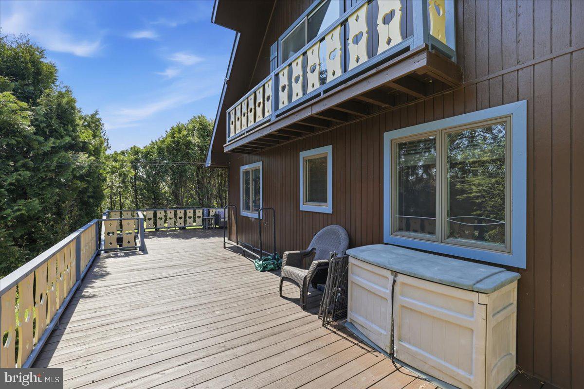 25 Fall Place Union Dale, PA 18470 - Photo 66 of 99 Spacious deck with serene views.