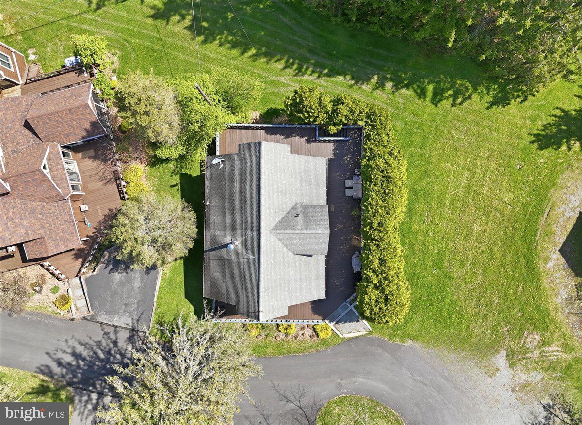 25 Fall Place Union Dale, PA 18470 - Photo 76 of 99 an aerial view of a house with a yard