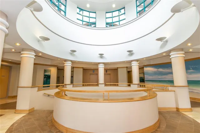 a kitchen with stainless steel appliances granite countertop a refrigerator and microwave