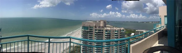 a view of a city and ocean view