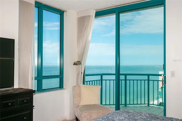 a bathroom with a sink toilet and a mirror