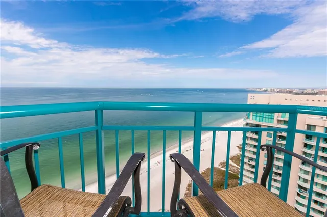 a view of a city with an ocean view