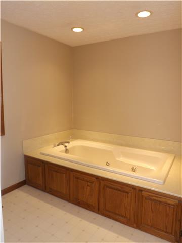 173 Urban Farms Road Manchester, TN 37355 - Photo 14 of 20 a bathroom with a sink and a mirror