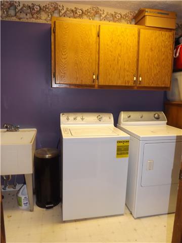 173 Urban Farms Road Manchester, TN 37355 - Photo 20 of 20 a utility room with dryer and washer