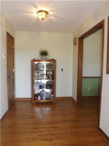 173 Urban Farms Road Manchester, TN 37355 - Photo 7 of 20 a view of a room with wooden floor and chair