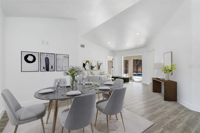 a view of a dining room with furniture