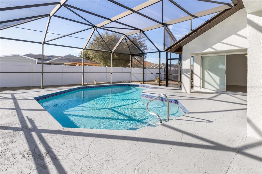 375 Waterside Street Port Charlotte, FL 33954 - Photo 3 of 49 a view of a backyard