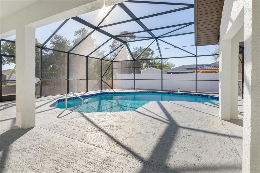 375 Waterside Street Port Charlotte, FL 33954 - Photo 38 of 49 a view of a backyard