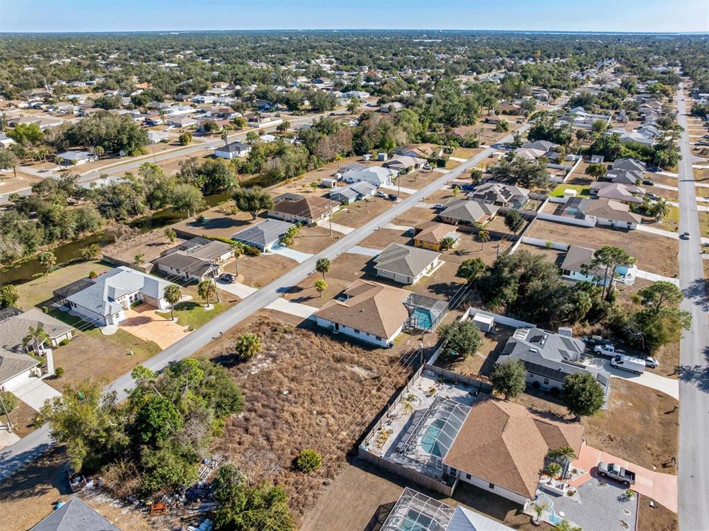 375 Waterside Street Port Charlotte, FL 33954 - Photo 47 of 49 an aerial view of residential houses with outdoor space