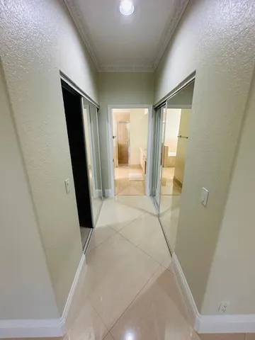 a large bathroom with a double vanity sink and a mirror