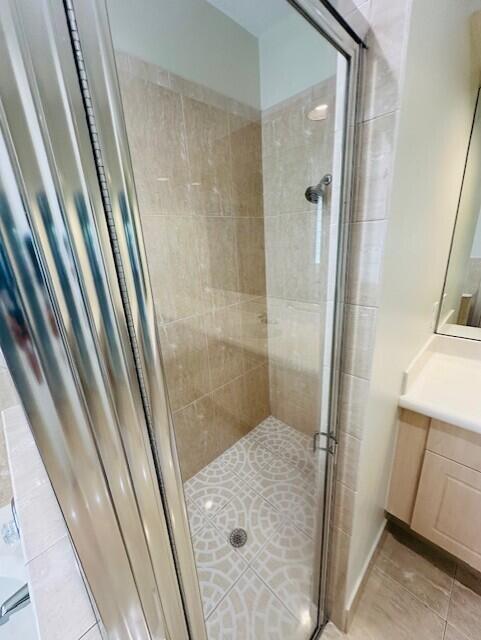5245 Sancerre Circle Lake Worth, FL 33463 - Photo 22 of 46 a bathroom with a shower and a sink