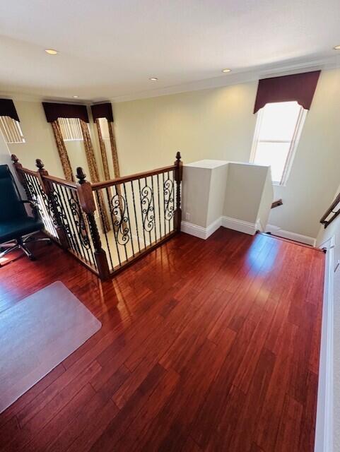 5245 Sancerre Circle Lake Worth, FL 33463 - Photo 29 of 46 a view of an empty room with wooden floor and stairs