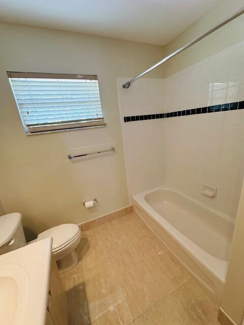 5245 Sancerre Circle Lake Worth, FL 33463 - Photo 37 of 46 a bathroom with a bathtub and a shower