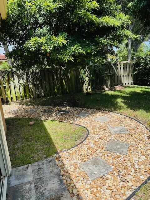 5245 Sancerre Circle Lake Worth, FL 33463 - Photo 45 of 46 a view of a backyard