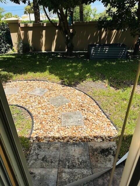 5245 Sancerre Circle Lake Worth, FL 33463 - Photo 46 of 46 a view of swimming pool from a window