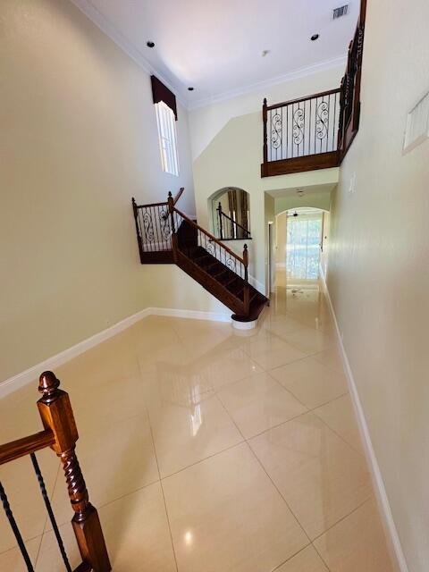 5245 Sancerre Circle Lake Worth, FL 33463 - Photo 6 of 46 a view of entryway with a front door