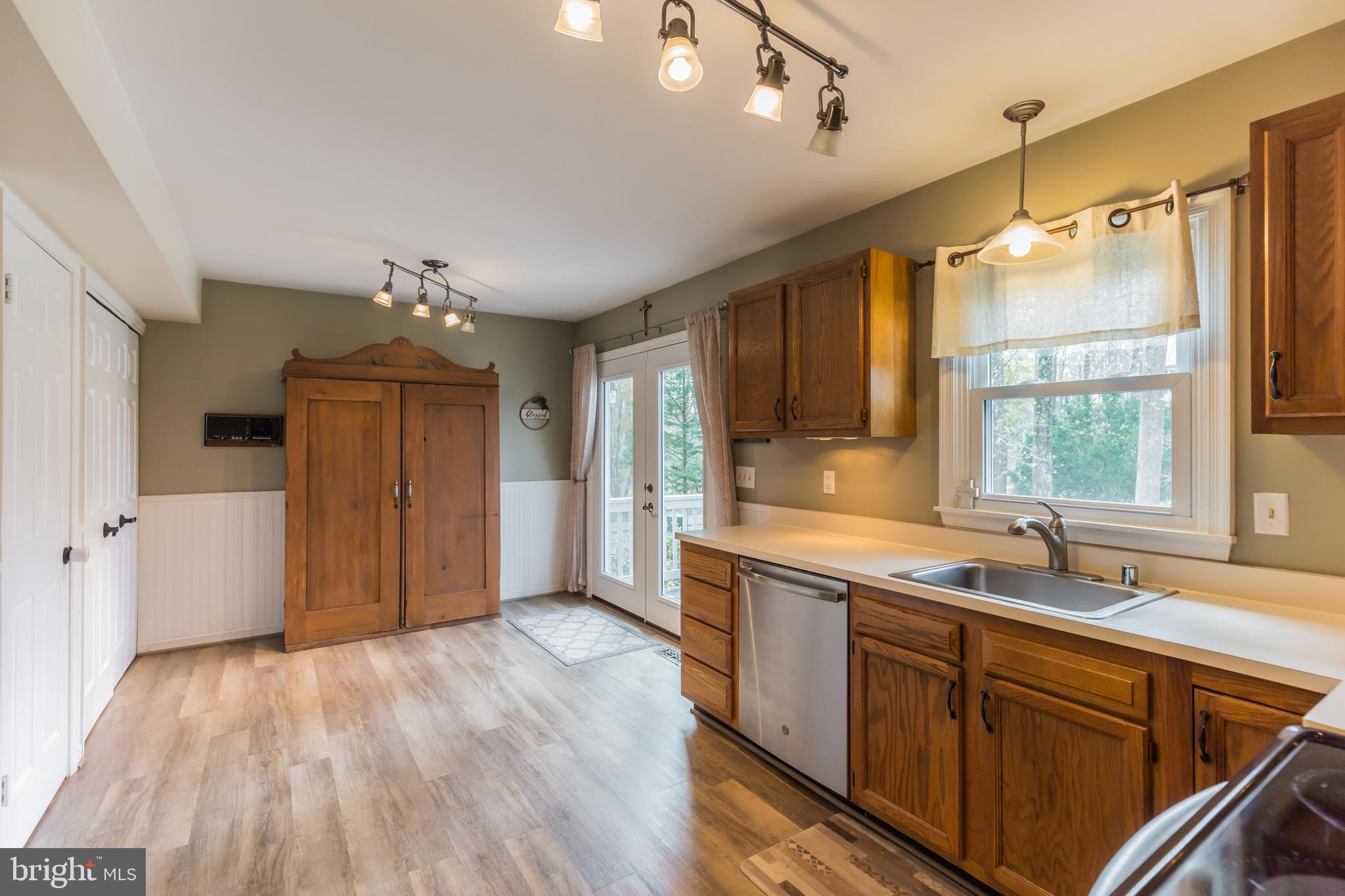 980 Bowie Shop Road Huntingtown, MD 20639 - Photo 11 of 30 Kitchen with Hardwood Floors