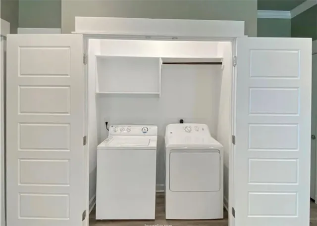 a utility room with dryer and washer