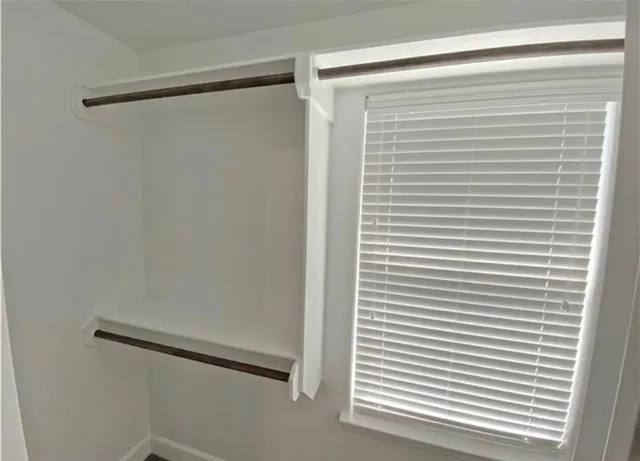 a view of a room with a window