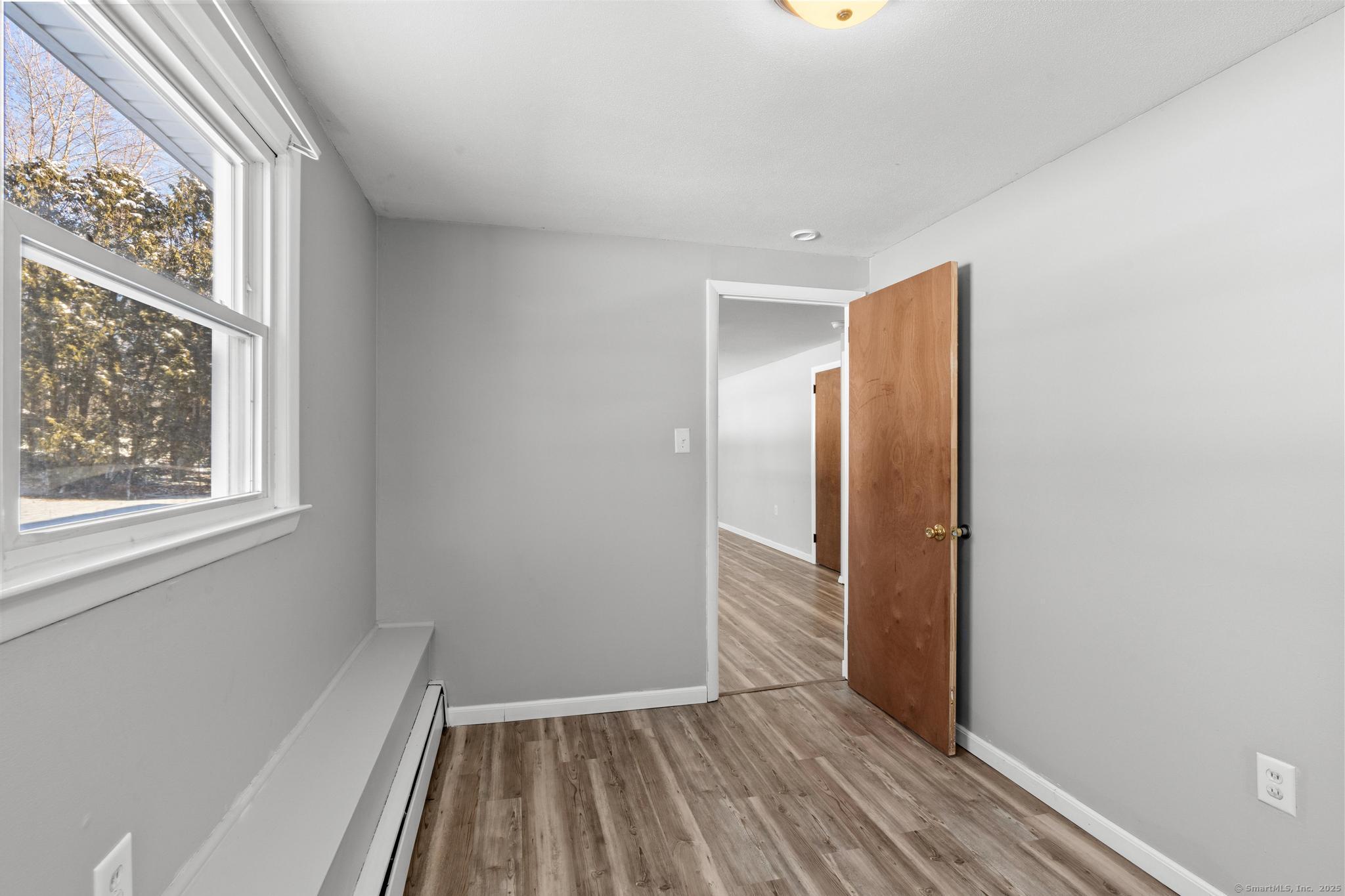 8 Kings Road Simsbury, CT 06089 - Photo 12 of 20 Only bedroom on the lower level - great for an office or bonus space