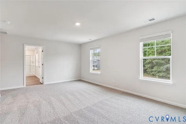 an empty room with windows