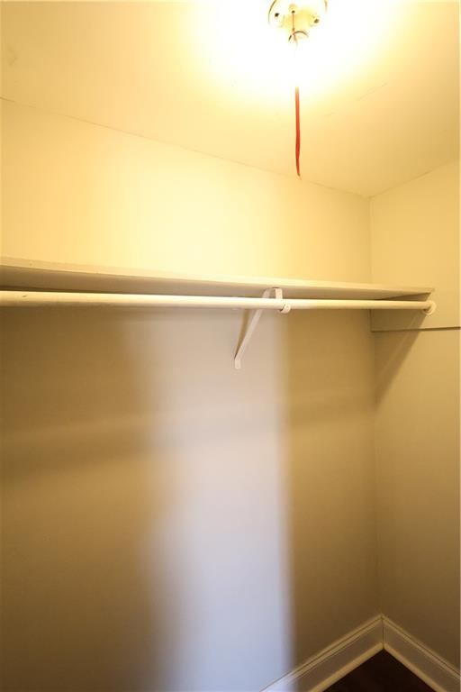 3091 Colonial Way, Unit H2 Chamblee, GA 30341 - Photo 13 of 17 a view of a room with racks on the wall