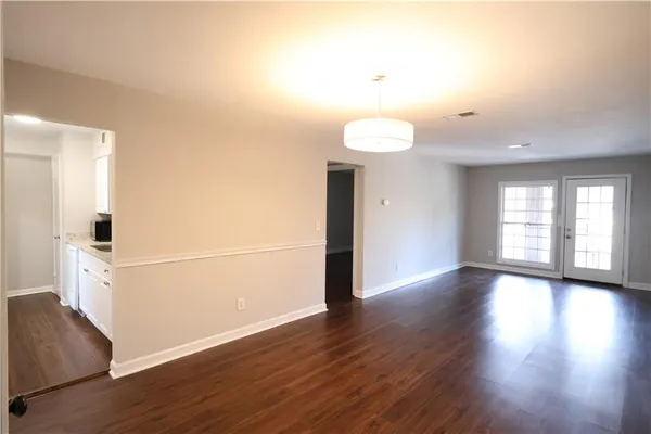 a view of livingroom with hardwood floor and window