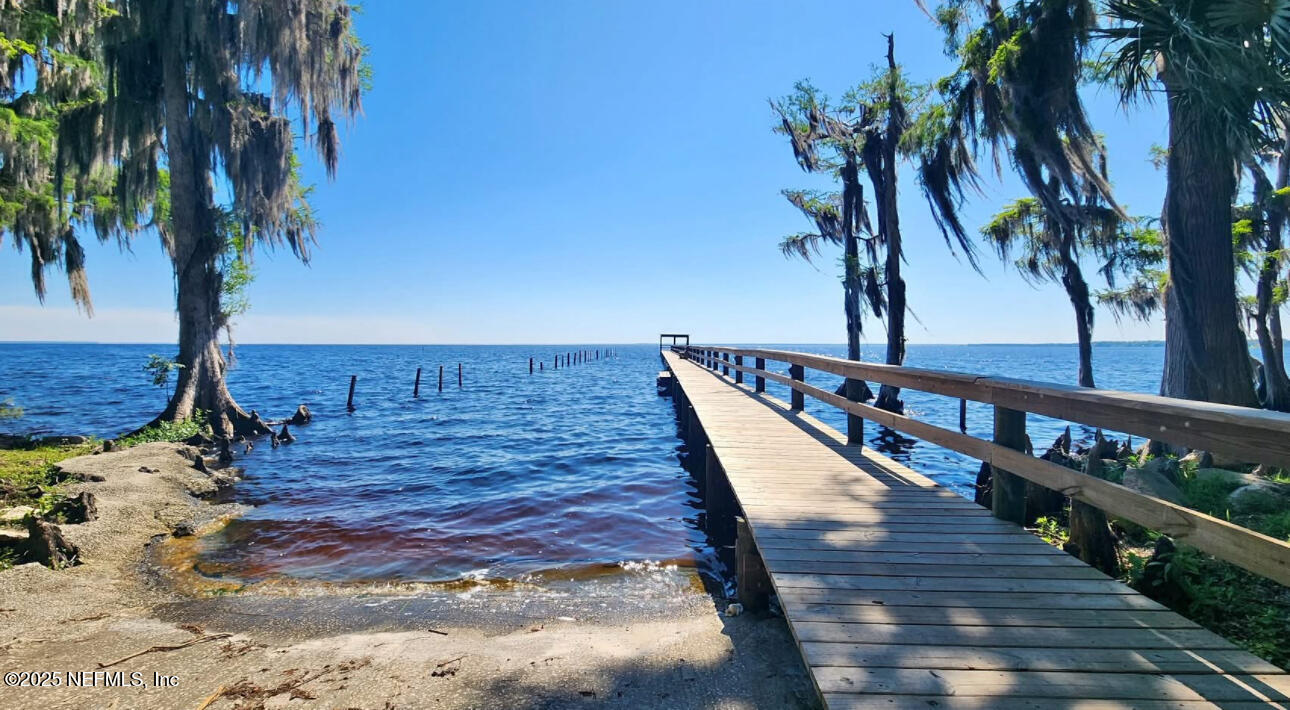 107 Georgetown Point Road Georgetown, FL 32139 - Photo 14 of 14 a view of wooden floor with a lake
