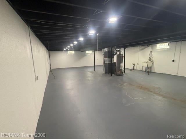 580 Palmerston Street River Rouge, MI 48218 - Photo 15 of 19 Spacious lower-level area with painted concrete flooring and white textured walls