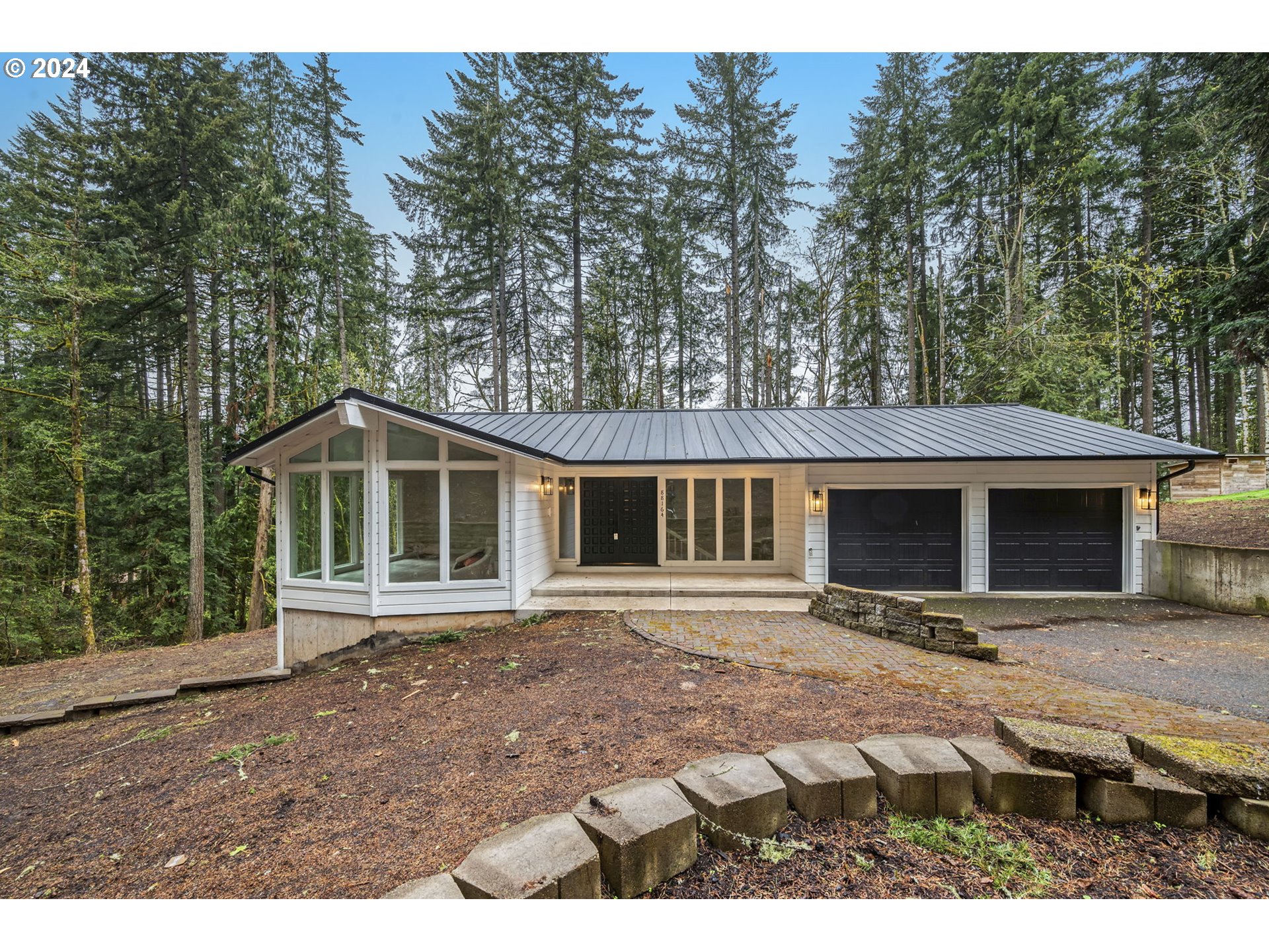 a front view of a house with yard