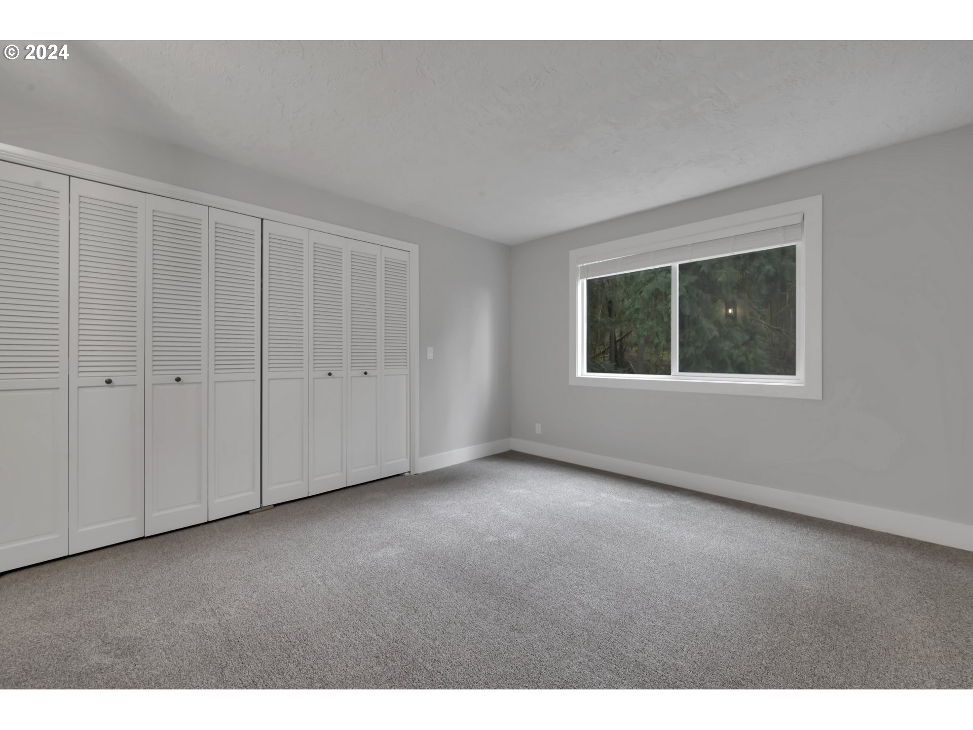 88164 Chita Loop Springfield, OR 97478 - Photo 23 of 48 a view of an empty room with a window