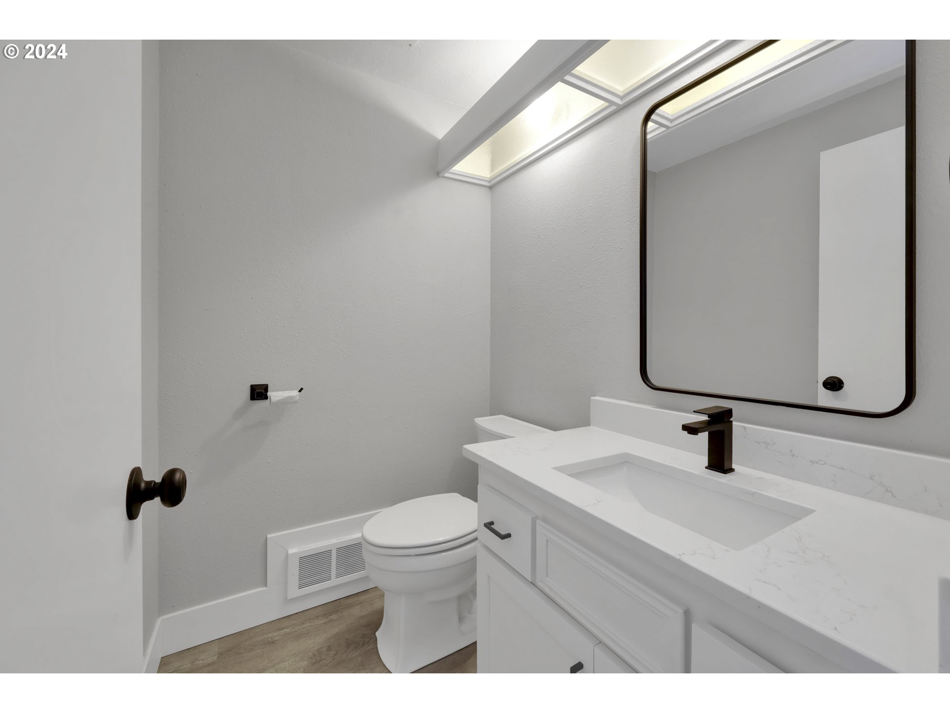 88164 Chita Loop Springfield, OR 97478 - Photo 26 of 48 a bathroom with a sink toilet and mirror