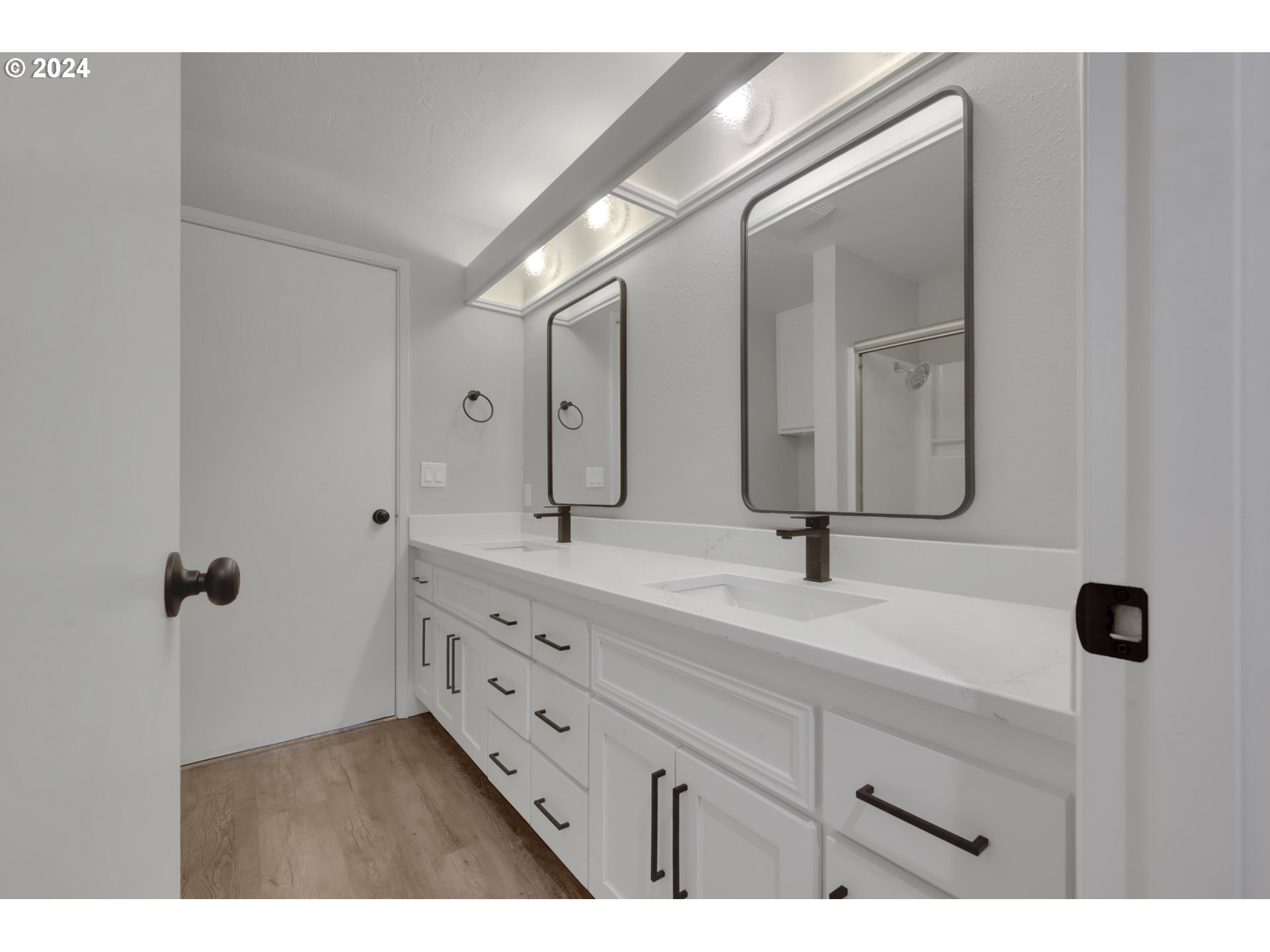 88164 Chita Loop Springfield, OR 97478 - Photo 27 of 48 a bathroom with a double vanity sink and mirror