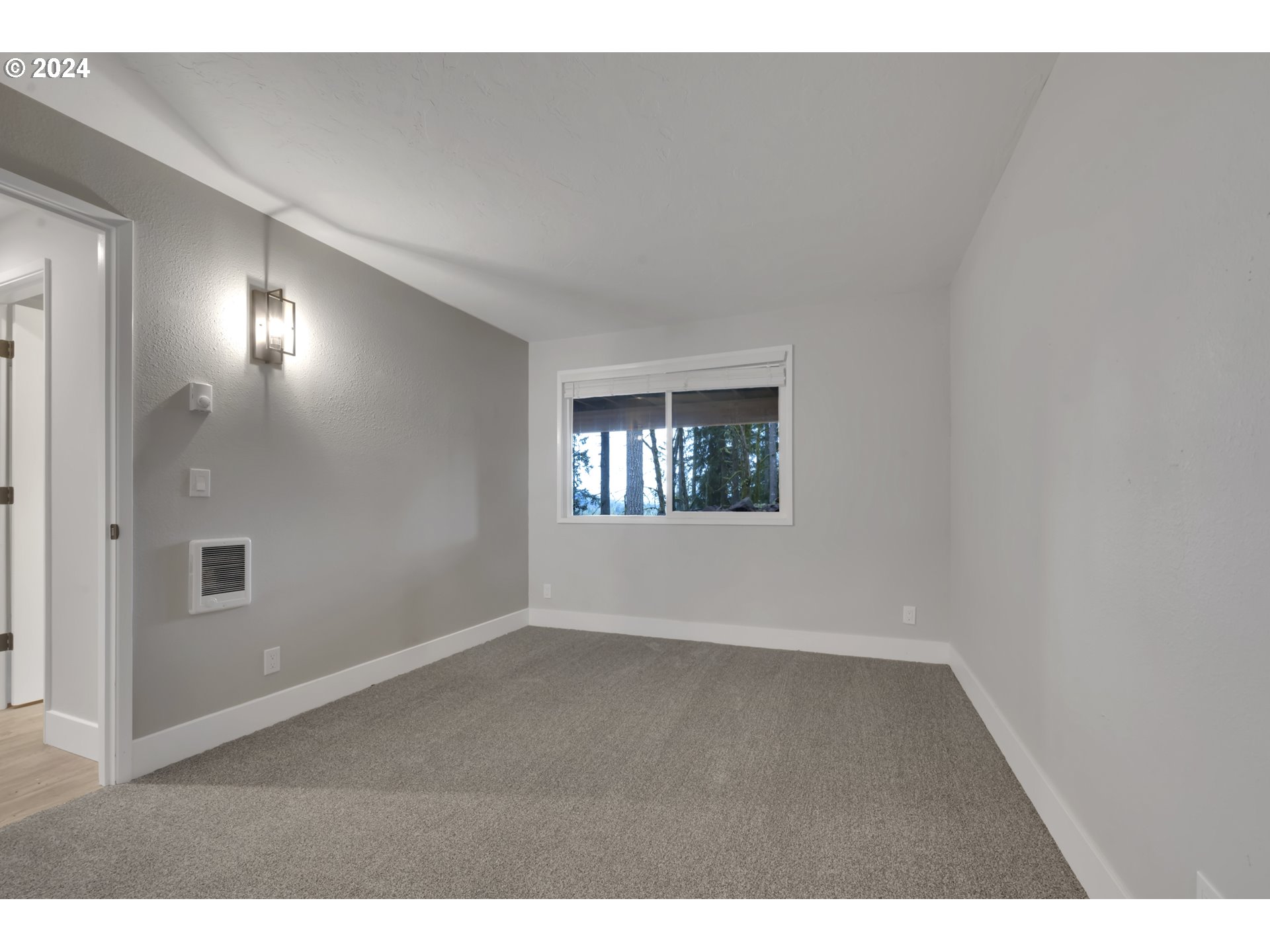 88164 Chita Loop Springfield, OR 97478 - Photo 29 of 48 a view of an empty room with a window