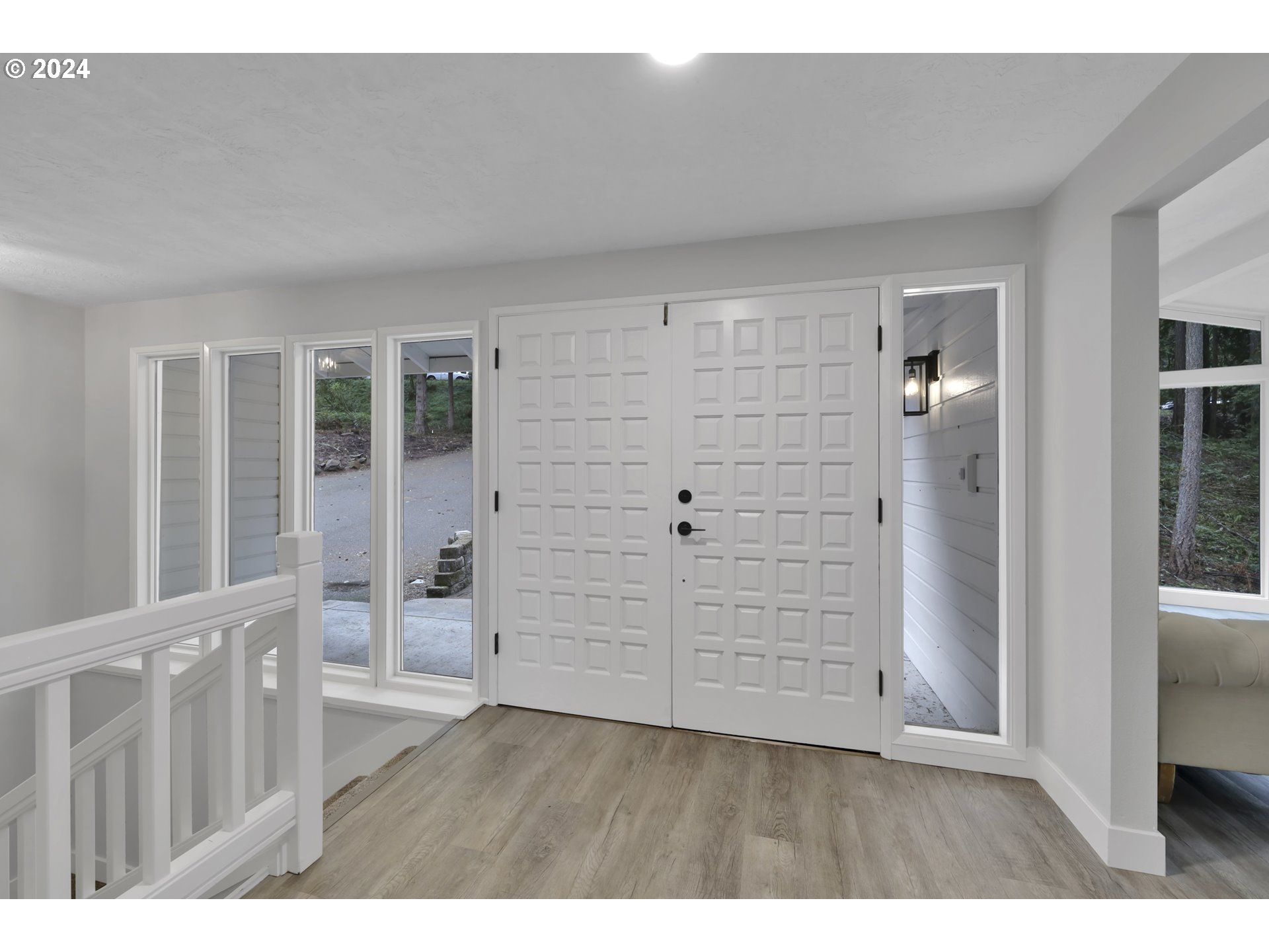 88164 Chita Loop Springfield, OR 97478 - Photo 3 of 48 a view of wooden floor and windows in a room