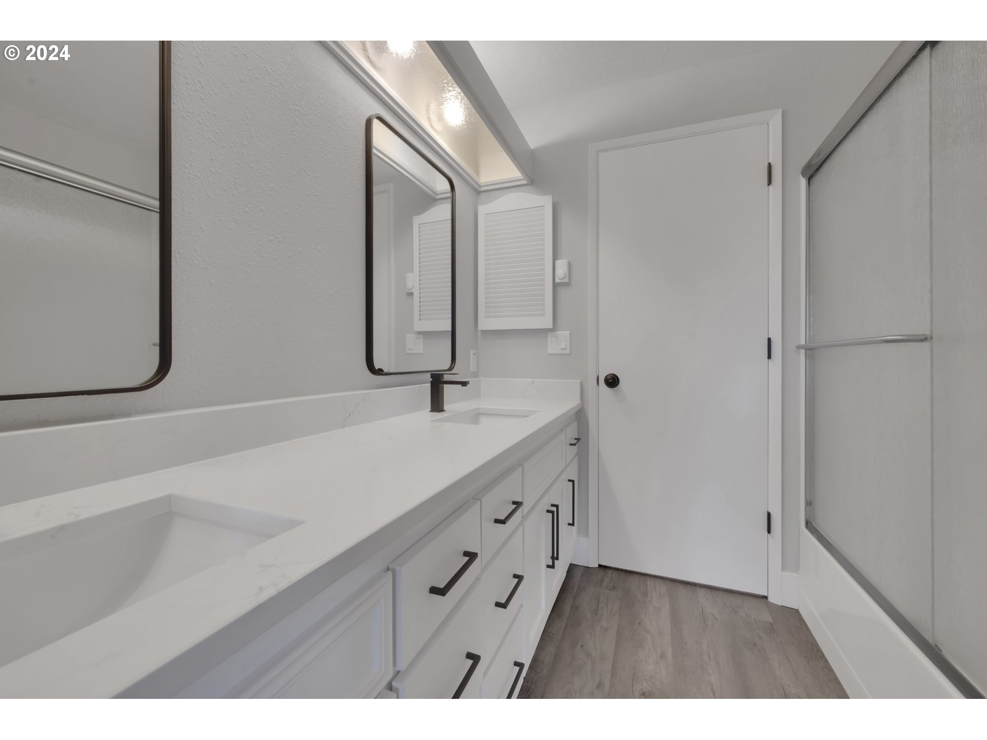88164 Chita Loop Springfield, OR 97478 - Photo 31 of 48 a bathroom with a double vanity sink and mirror