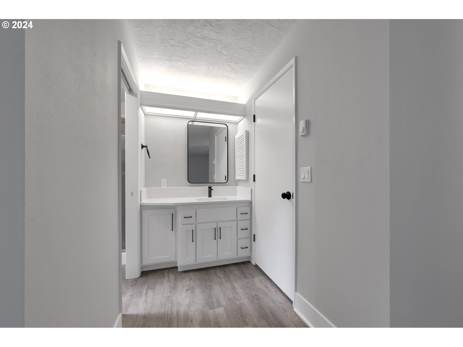 88164 Chita Loop Springfield, OR 97478 - Photo 36 of 48 a bathroom with a double vanity sink and mirror