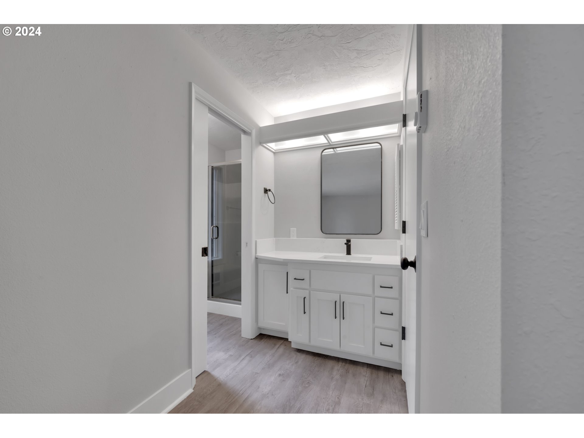 88164 Chita Loop Springfield, OR 97478 - Photo 37 of 48 a bathroom with a sink and a mirror