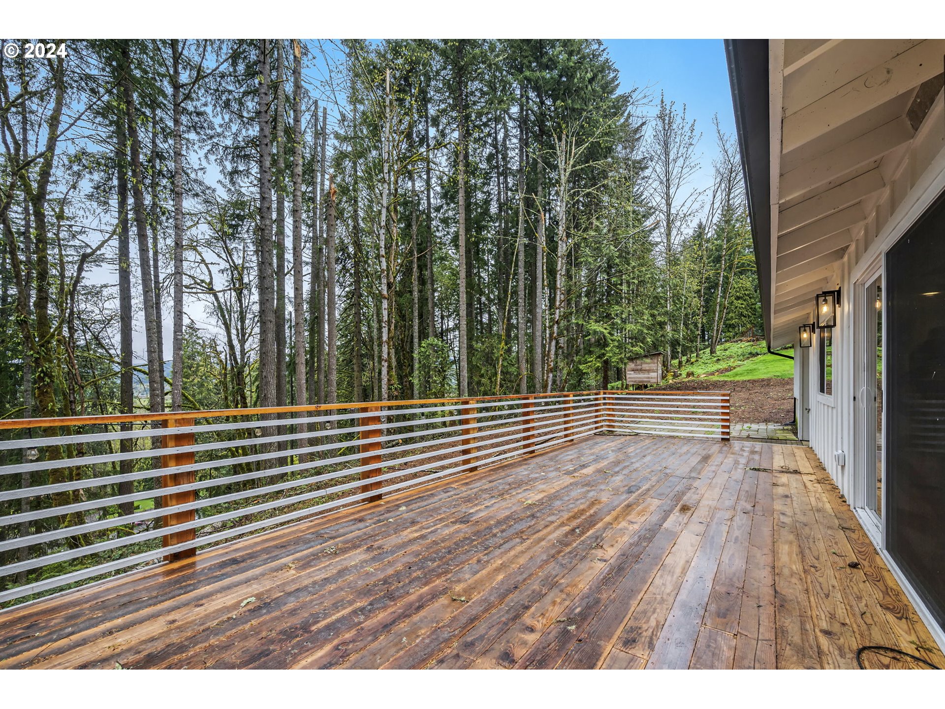 88164 Chita Loop Springfield, OR 97478 - Photo 41 of 48 a view of a wooden deck with a yard