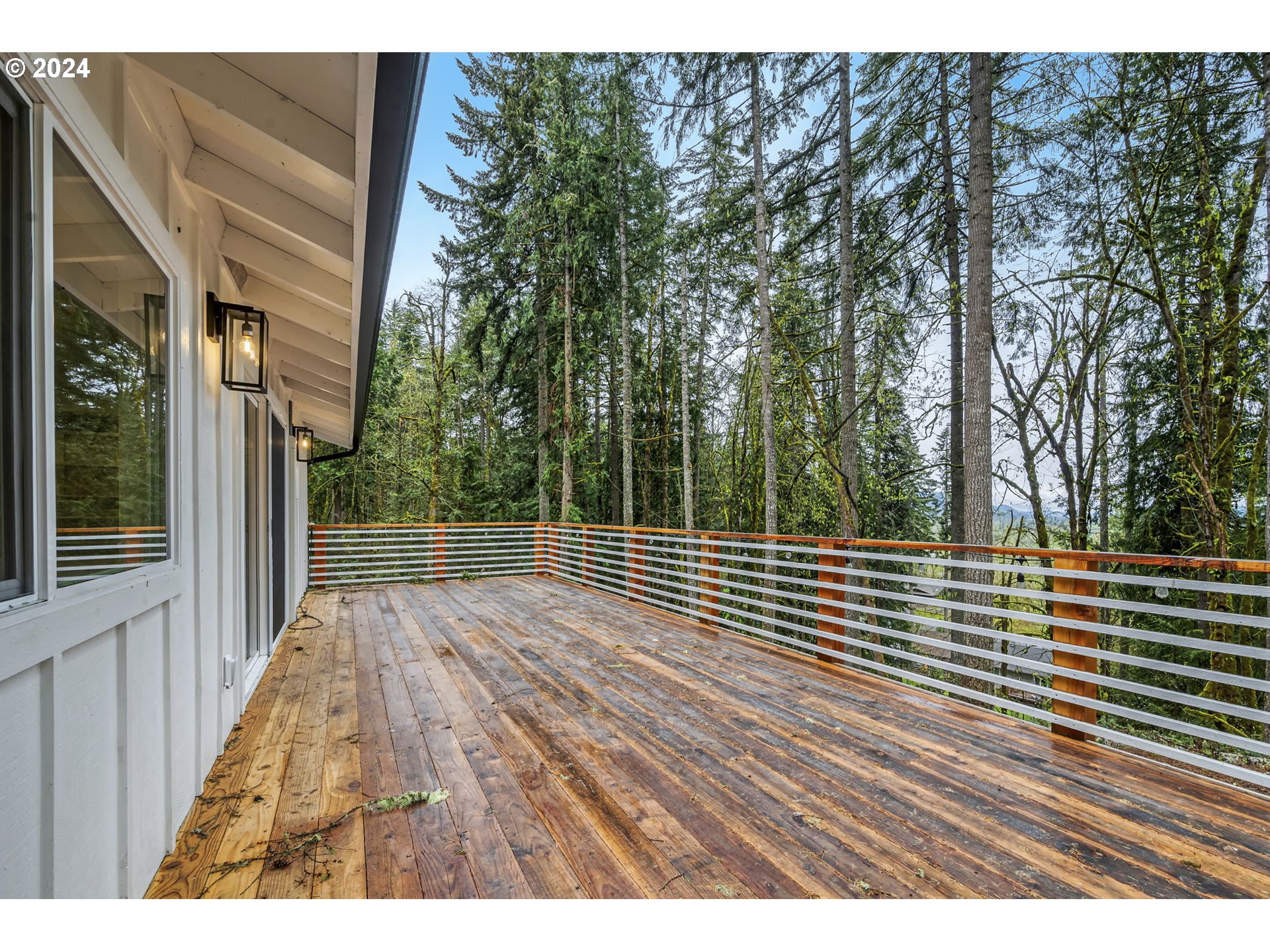 88164 Chita Loop Springfield, OR 97478 - Photo 42 of 48 a view of balcony with wooden floor and fence