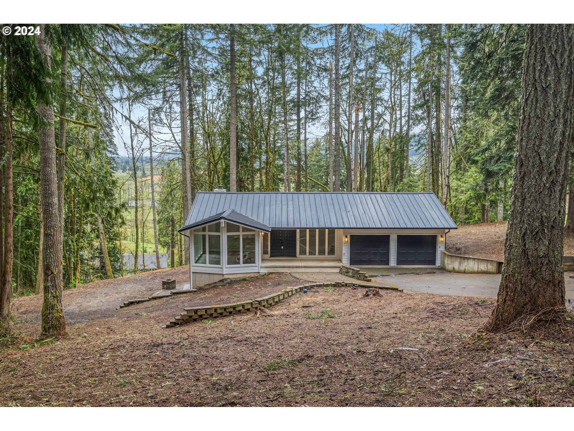 88164 Chita Loop Springfield, OR 97478 - Photo 46 of 48 a house with a tree in front of it