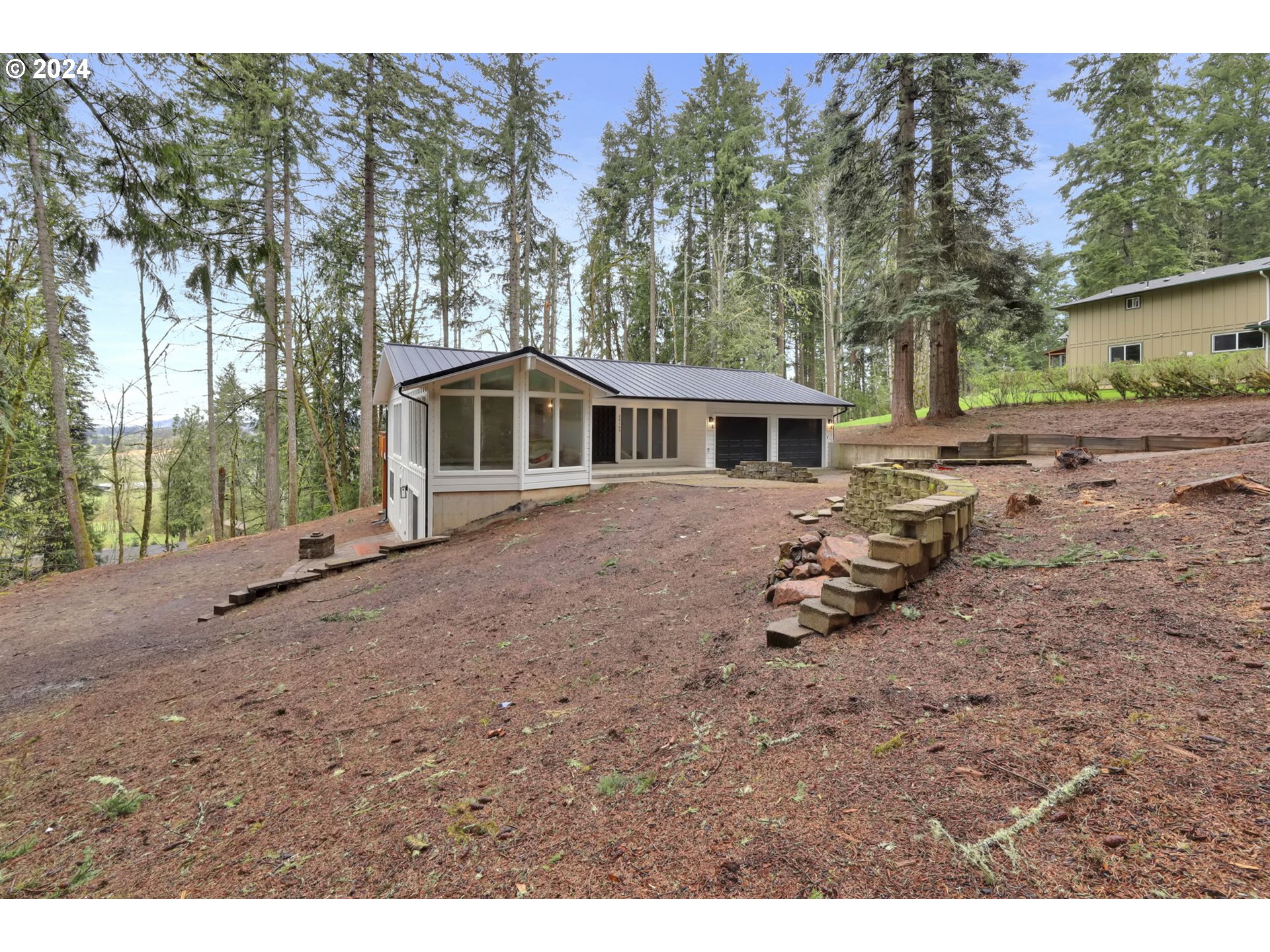 88164 Chita Loop Springfield, OR 97478 - Photo 47 of 48 a view of a house with a yard and trees