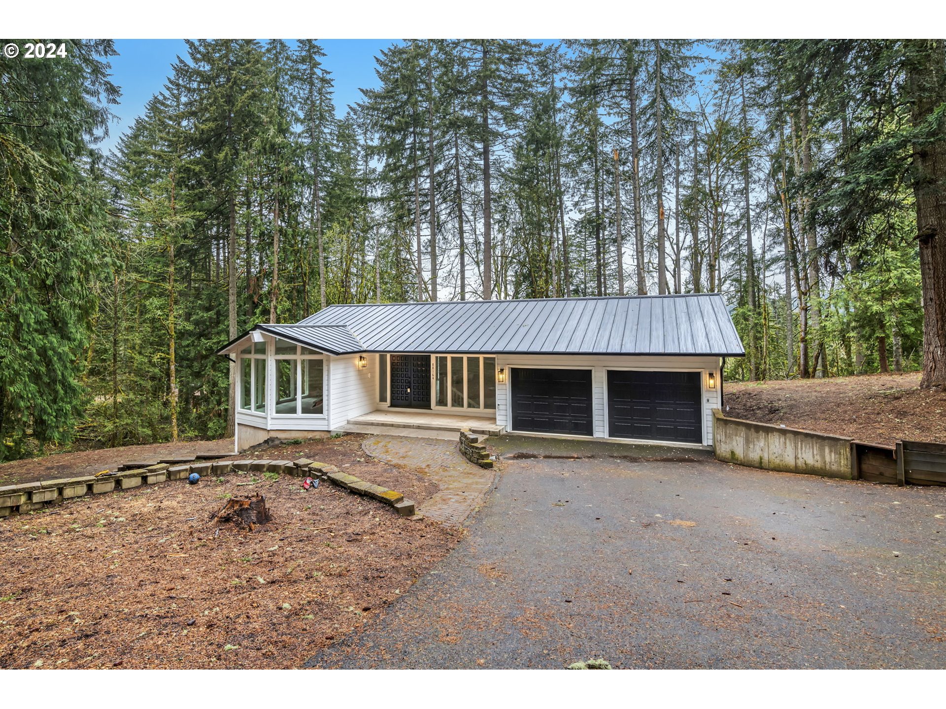 88164 Chita Loop Springfield, OR 97478 - Photo 48 of 48 a view of a house with large trees and wooden fence